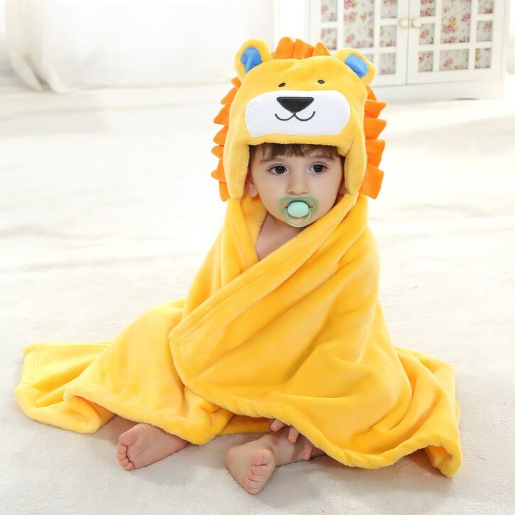 Poncho bébé jaune de bain lion